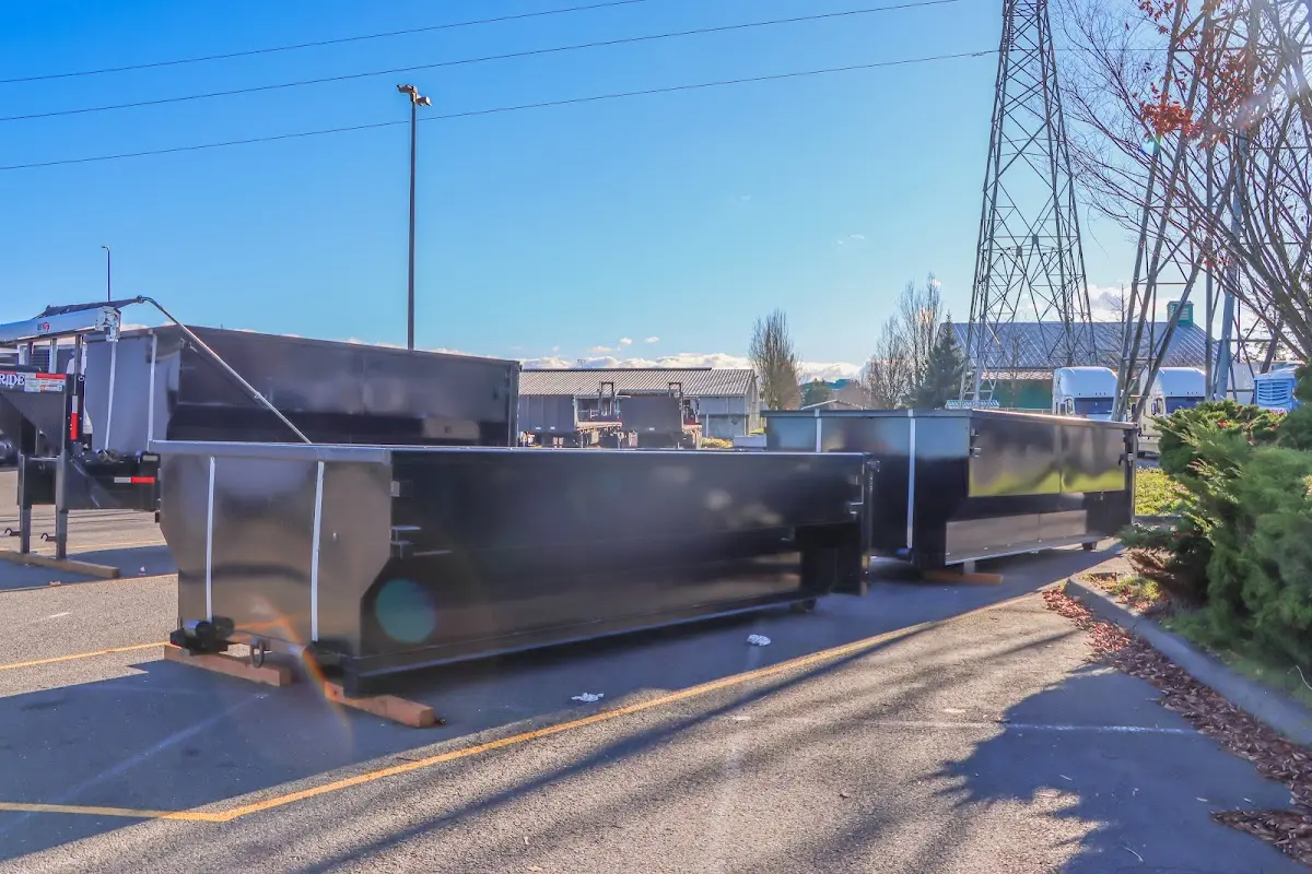 Roll-off dumpster ready for waste disposal at job site for Roofing Dumpster Rental in White Lake